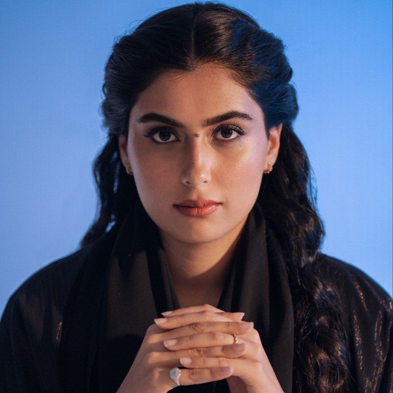 Portrait of Amira Sajwani in formal attire, exemplifying her leadership in luxury property development.