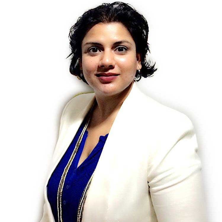 Portrait of Dr. Ruchi Dana in formal attire, symbolizing her transformative leadership in healthcare and business.
