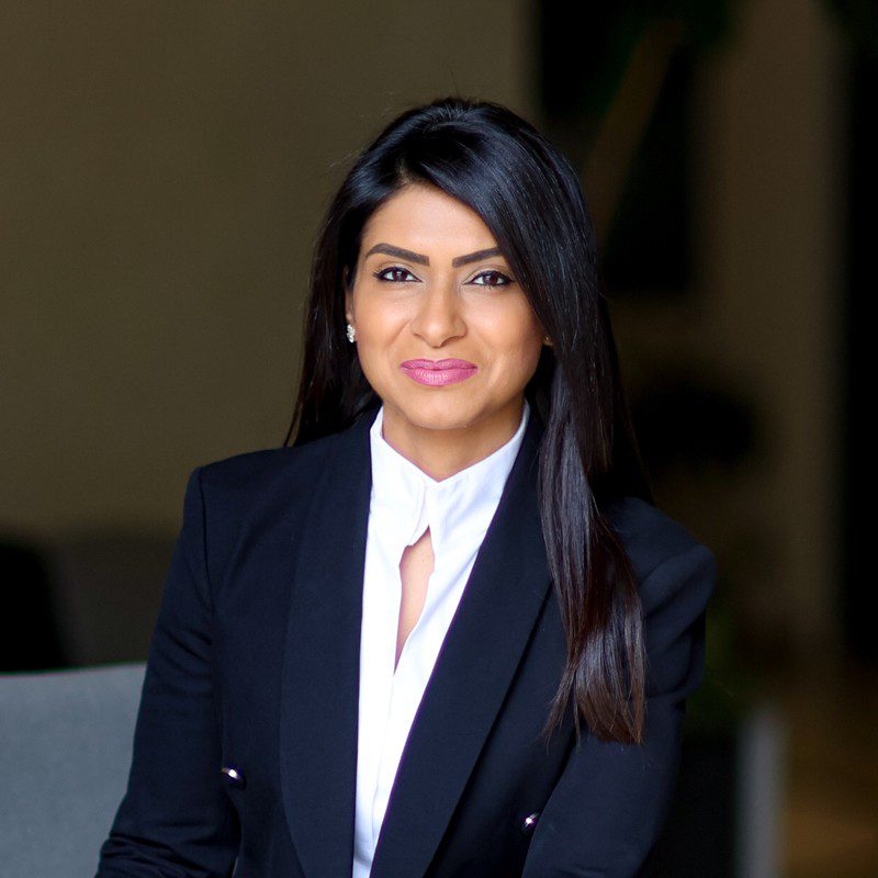 Portrait of Meher Mirchandani in formal attire, symbolizing her commitment to holistic and authentic leadership.