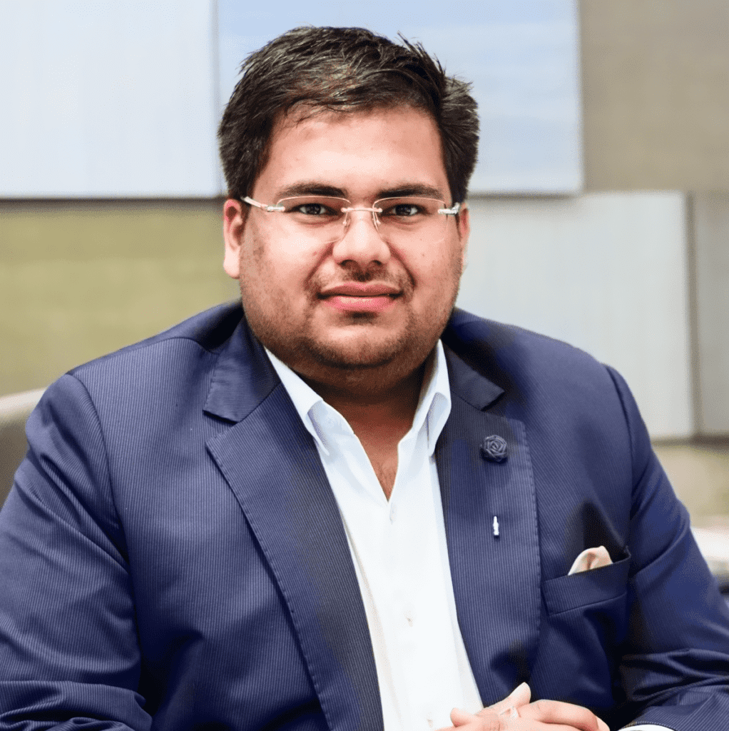 Portrait of Prerit Goel in formal attire, representing his transformative leadership and innovative business approach.