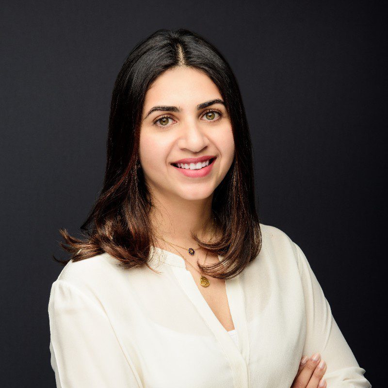 Portrait of Sophiya Faizal in formal attire, representing her leadership in driving innovation and social responsibility at KEF Holdings.