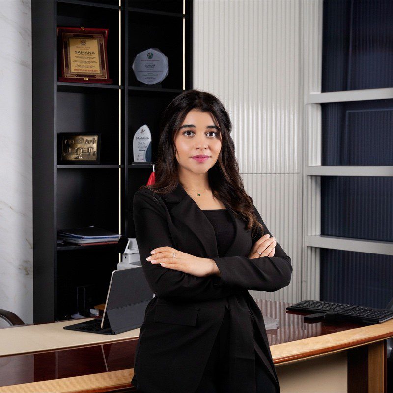 Portrait of Urusa Imran in formal attire, representing her leadership and transformative impact in real estate and social empowerment.